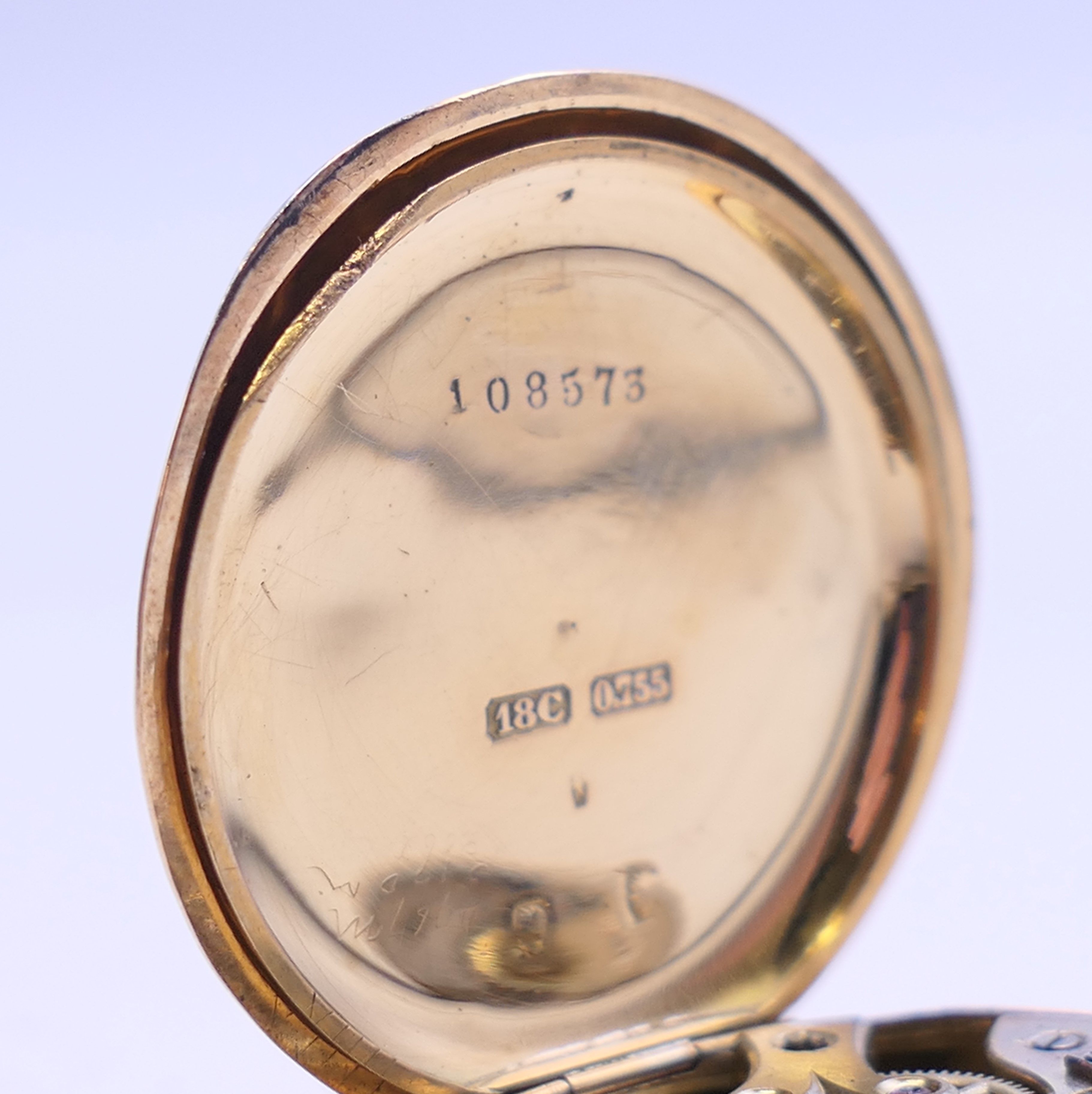 An 18 ct gold cased fob watch. 3.25 cm diameter. 31.7 grammes total weight. - Image 10 of 10