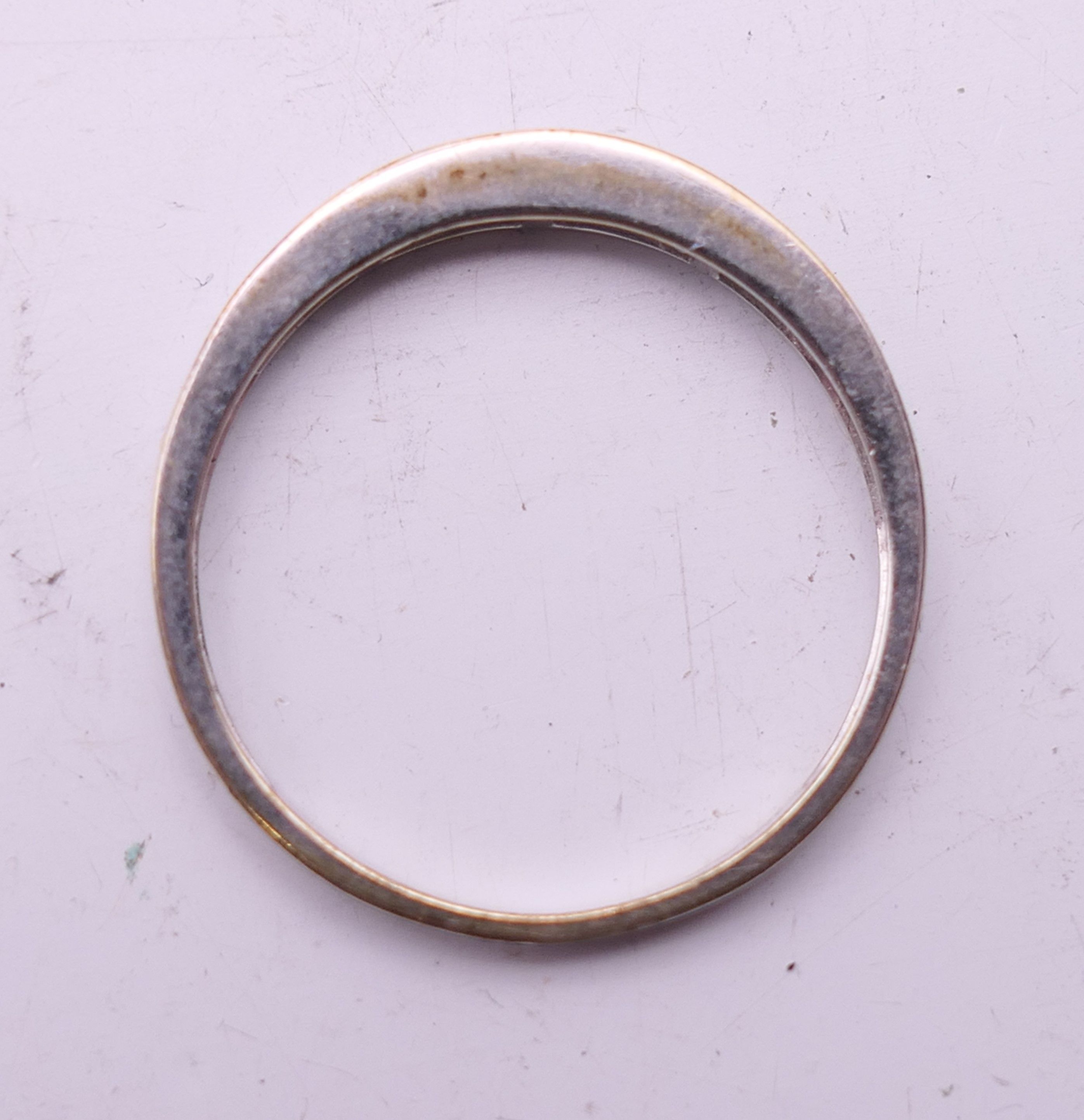 A 10 k white gold baguette diamond half eternity ring. Ring size N. - Image 5 of 5