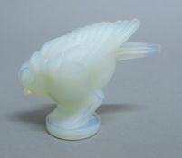 A Sabino vaseline glass bird. 7 cm high.