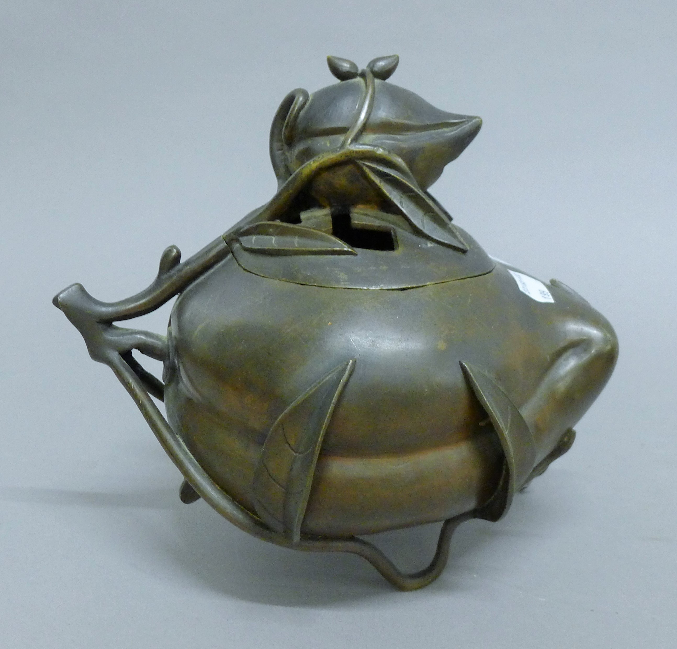 A 19th century Chinese bronze censer formed as a peach. 20 cm high.