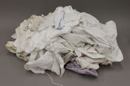 A quantity of various linen, lace, etc.