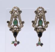 A pair of silver multi-stone earrings. 4 cm high.
