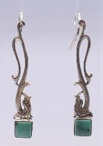 A pair of silver and turquoise earrings. 7 cm high.