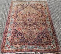 A Middle Easten wool rug. 192 x 119 cm.