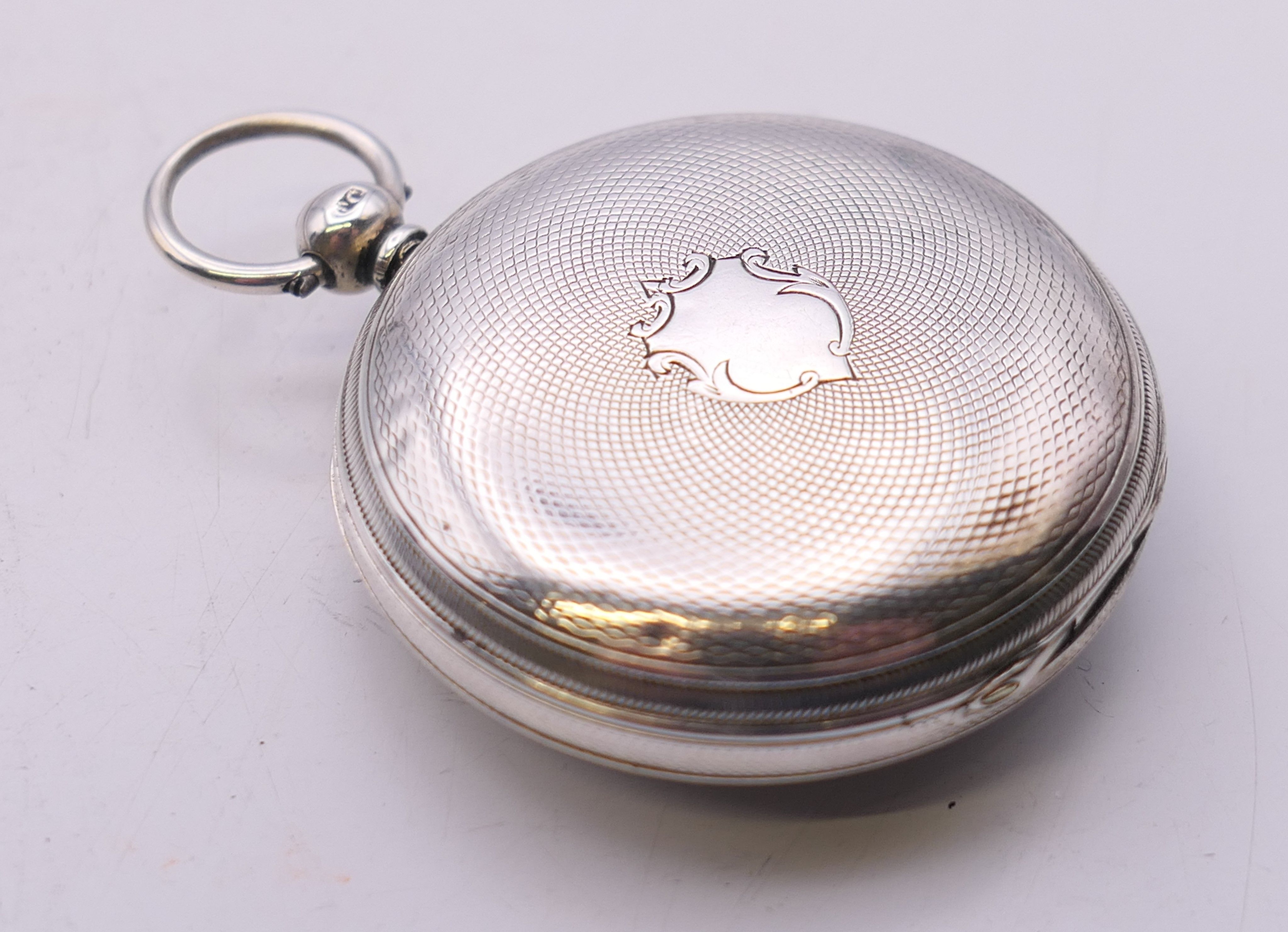 A silver pocket watch with engraved dial, hallmarked for London 1855. 4 cm diameter. - Image 6 of 6