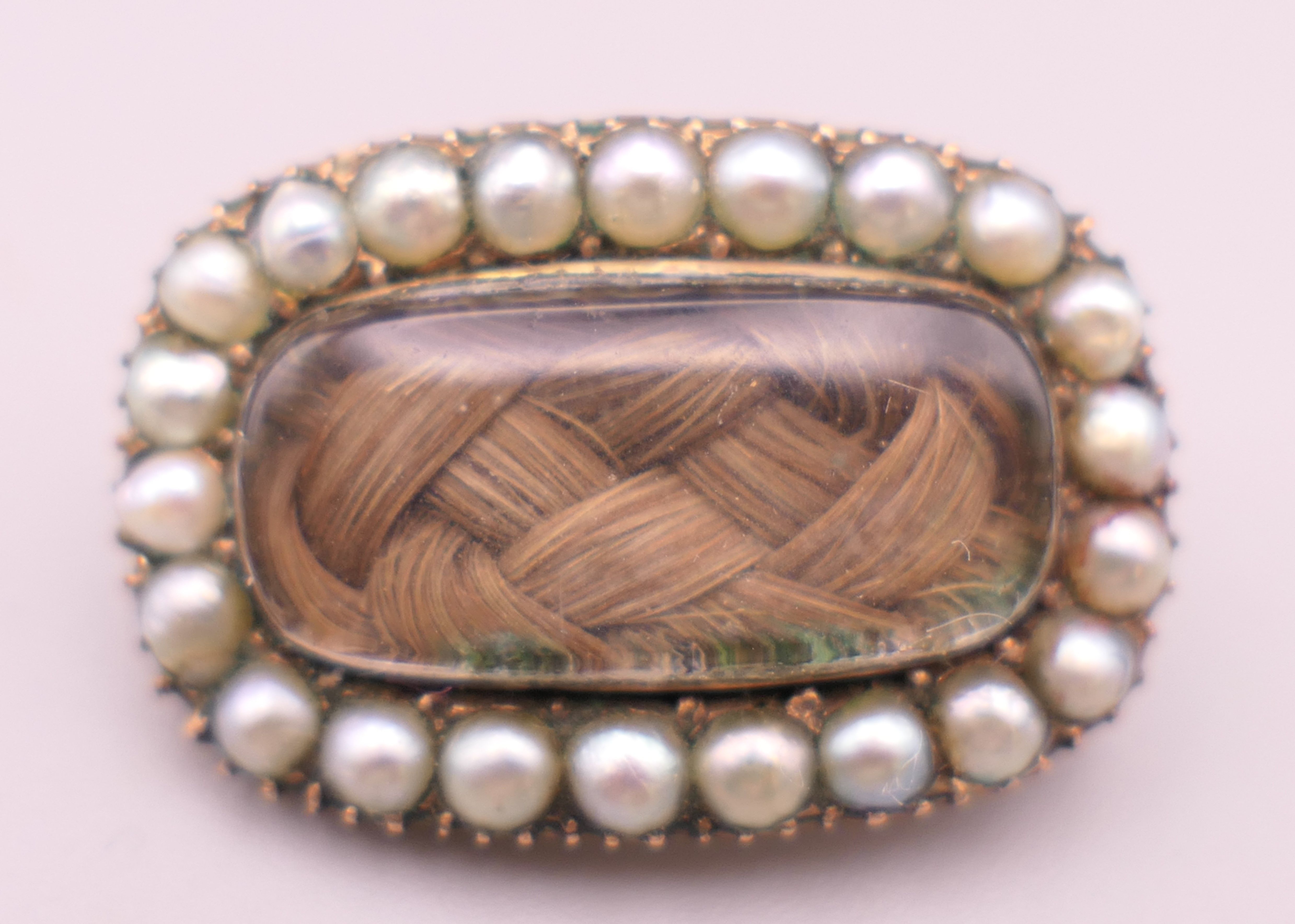 A cameo brooch, a pearl necklace, a mourning brooch and a horseshoe form stick pin. - Image 5 of 9