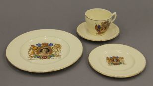 A quantity of decorative ceramics and glassware including a Clarice Cliff Queen Elizabeth II