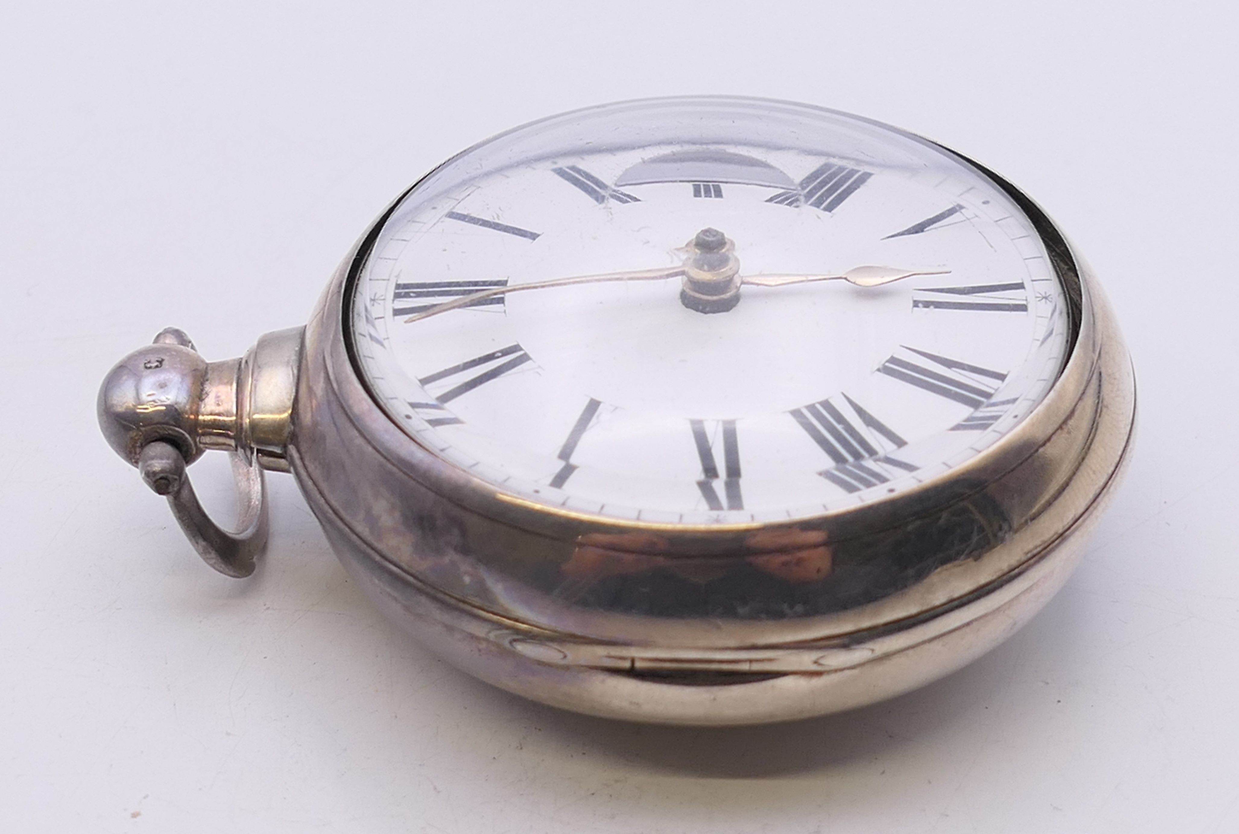 A silver pair cased pocket watch. 5.5 cm diameter. - Image 3 of 8