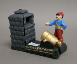 A cast iron Artillery money bank. 18.5 cm long.