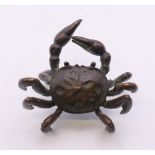 A small bronze crab. 6 cm wide.