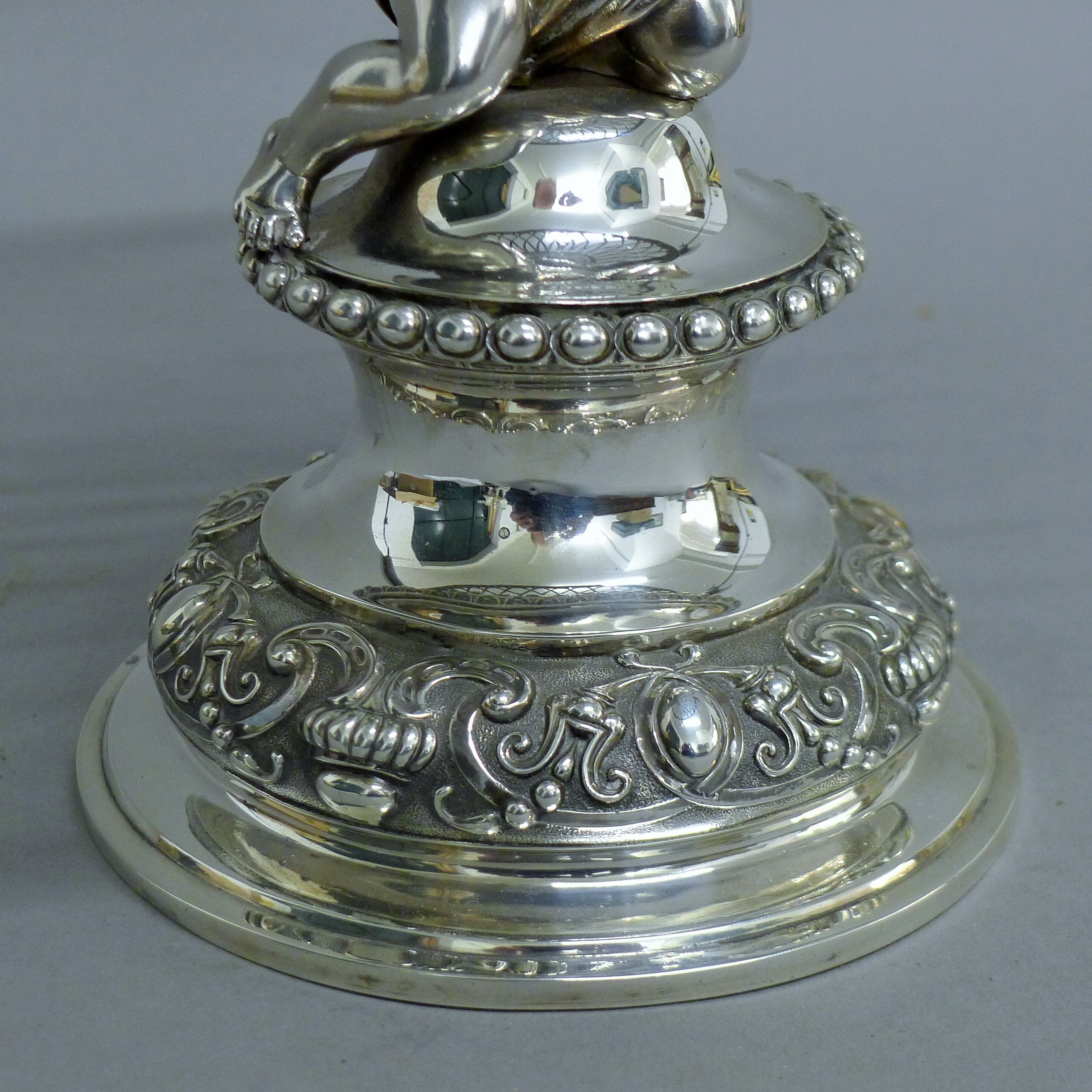 A Victorian silver centrepiece, the stem formed as a putto holding a pierced basket, - Image 6 of 10