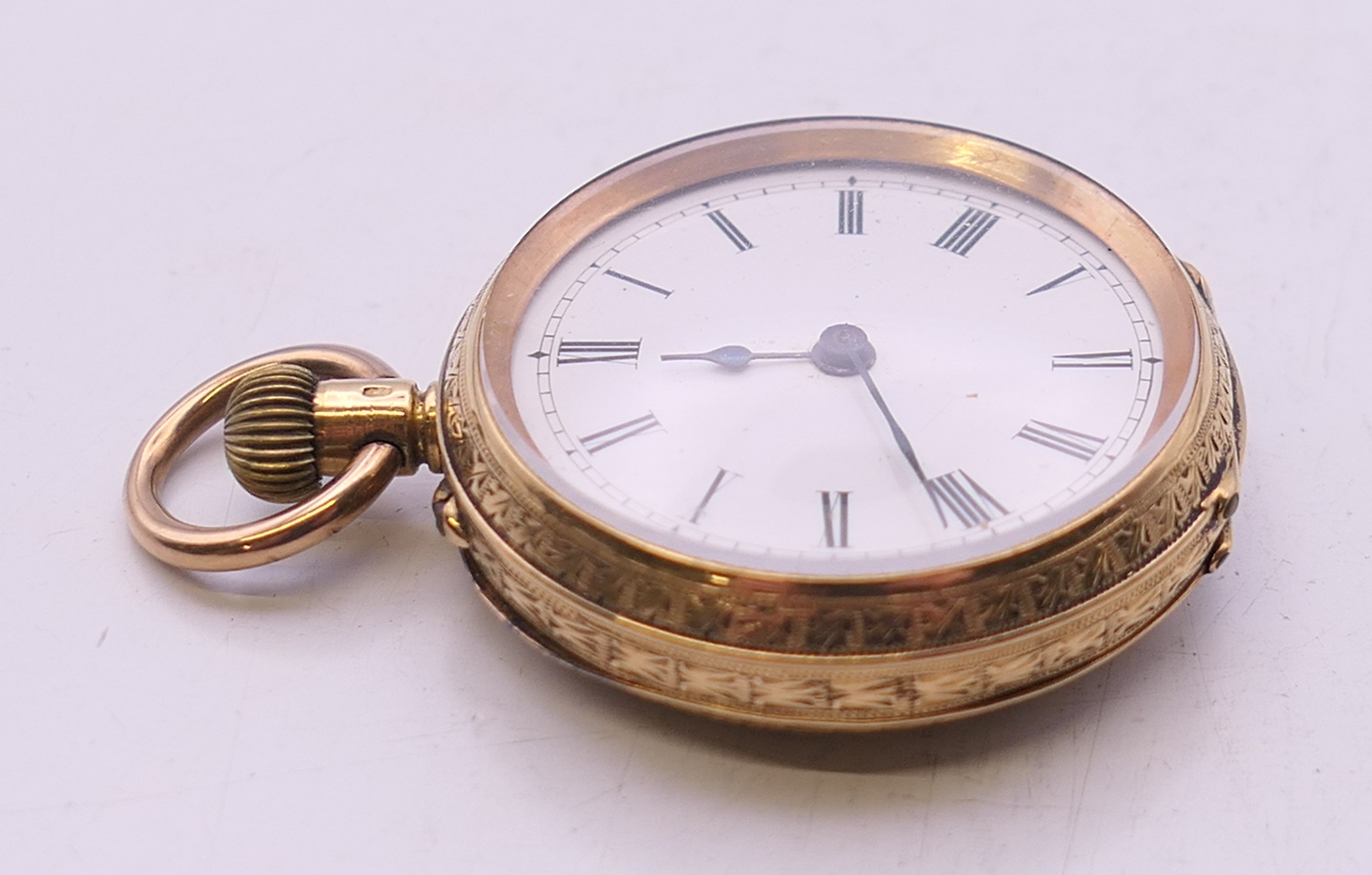 An 18 ct gold cased fob watch. 3.25 cm diameter. 31.7 grammes total weight. - Image 3 of 10