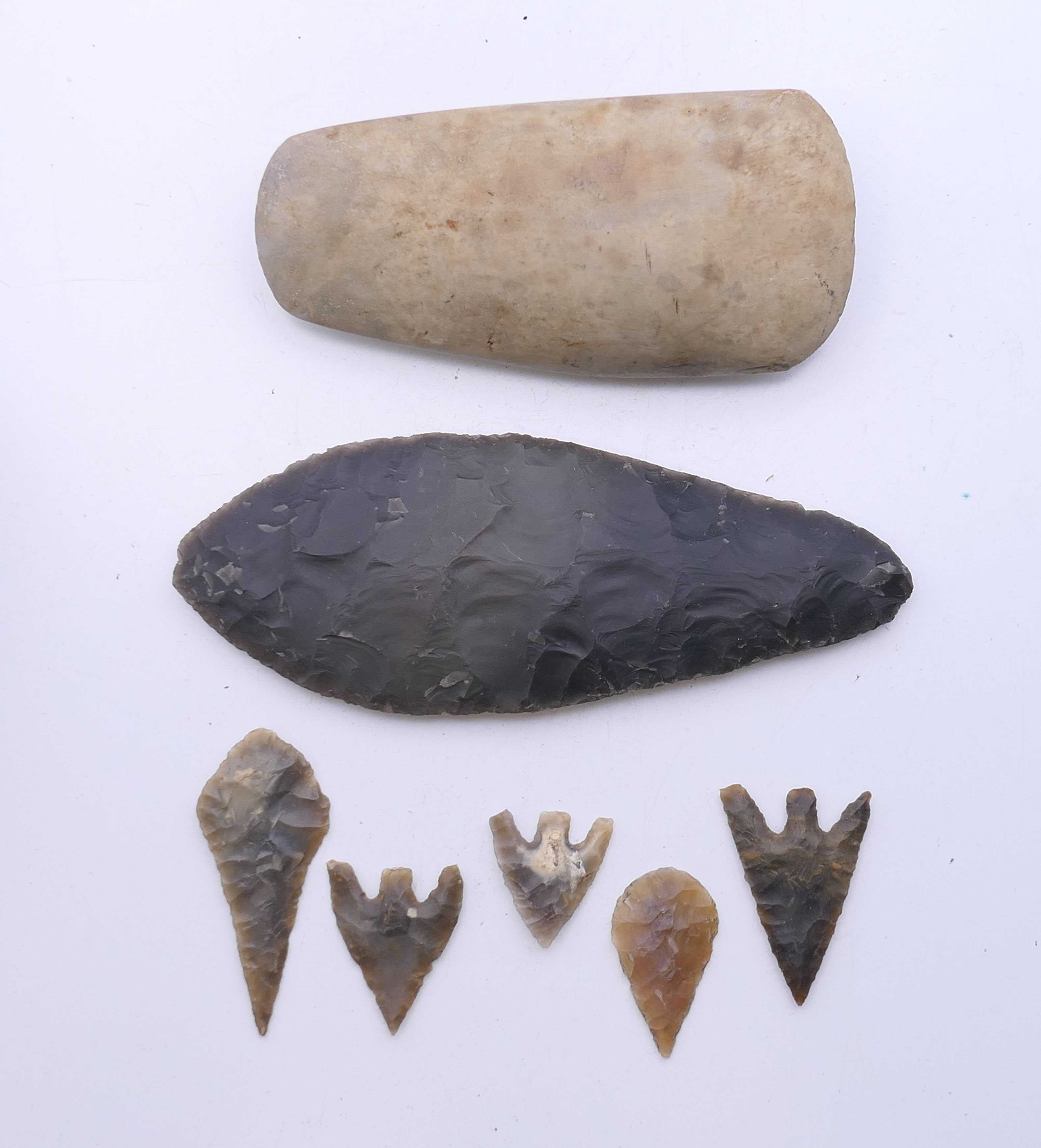 A polished stone axe head marked as having been found in Burwell Fen,