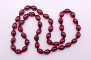 A bead necklace. 80 cm long.