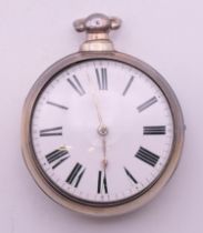 A silver pair cased pocket watch. 5.5 cm diameter.