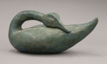 A painted terracotta model of a swan. 35 cm long.