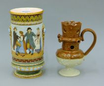 A Metlach porcelain vase and a porcelain puzzle jug. The former 24 cm high.