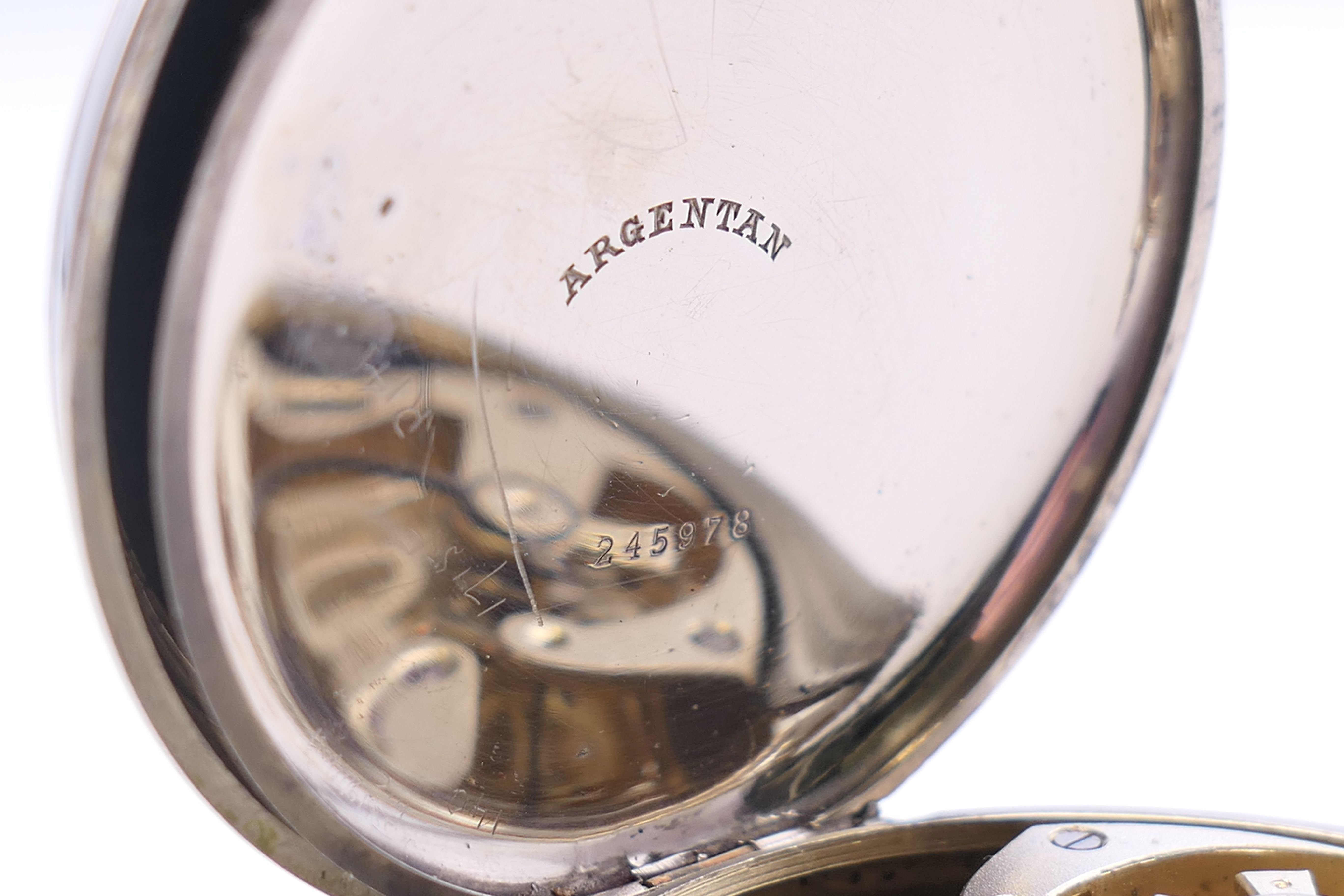 A Swiss silver plated Goliath pocket watch, housed in a silver-clad travelling case. - Image 8 of 9