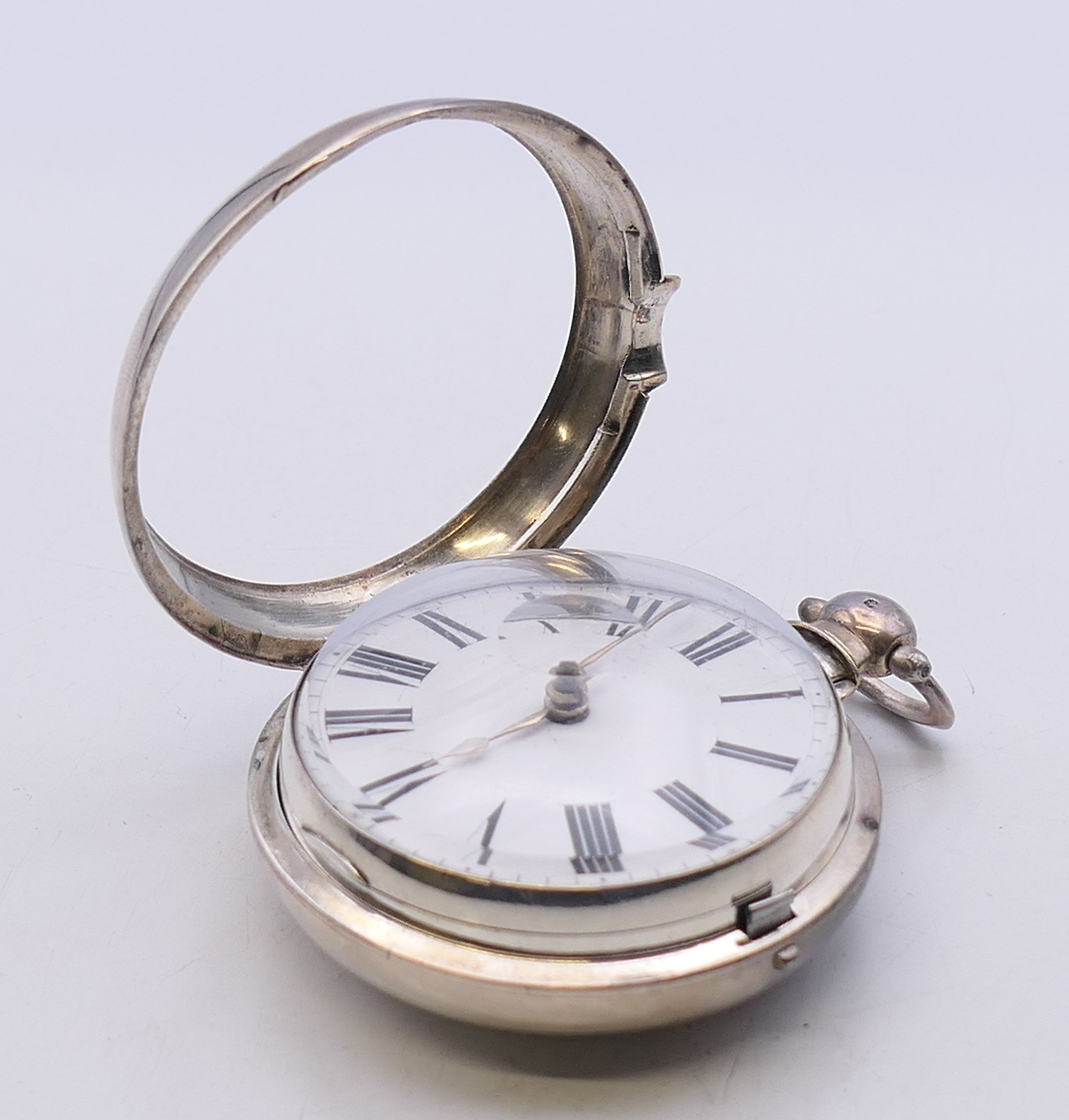 A silver pair cased pocket watch. 5.5 cm diameter. - Image 4 of 8