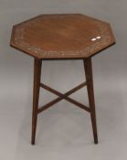 An early 20th century Arts and Crafts oak side table. 58.5 cm wide.