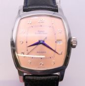 A boxed automatic Swiss Daniel Jean Richard gentleman's wristwatch. 3.5 cm wide.