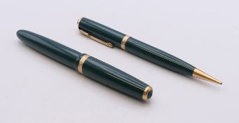 A boxed Parker pen and propelling pencil. The box 15 cm long.