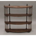 An early 20th century mahogany hanging shelf. 83 cm wide.