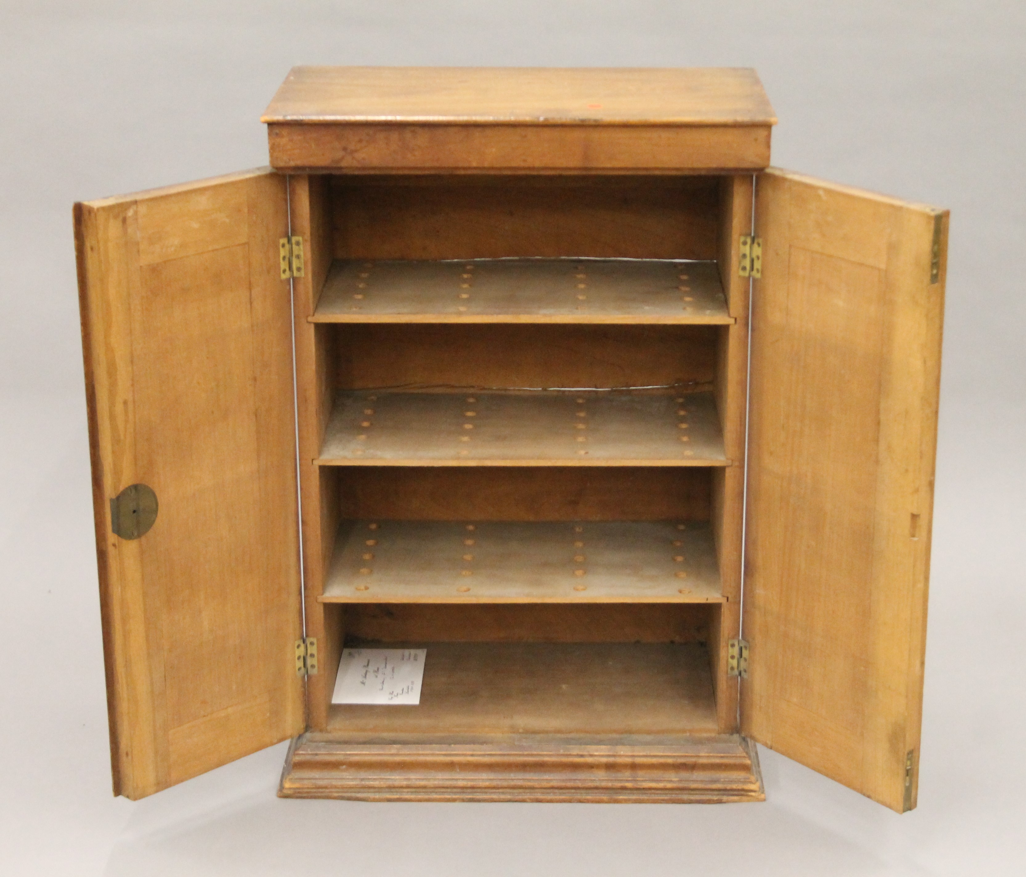 A late 19th century small walnut two-door cupboard. 45 cm wide x 66.5 cm high x 25.5 cm deep. - Image 4 of 8