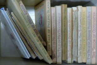 A quantity of miscellaneous items, including ordinance survey maps, Beatrix Potter books, porcelain,