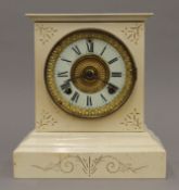 A late 19th/early 20th century American white painted metal mantle clock. 26 cm high.