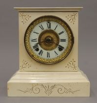 A late 19th/early 20th century American white painted metal mantle clock. 26 cm high.