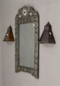 A Moroccan-style wall mirror and a pair of wall lights (uplighters). The former 54.5 cm wide.