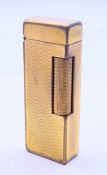 A boxed Dunhill lighter. 6.5 cm high.