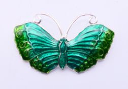 A silver butterfly brooch. 5.5 cm wide.