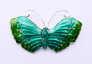 A silver butterfly brooch. 5.5 cm wide.