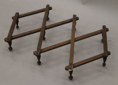 A wooden folding coat rack. 54 cm wide.