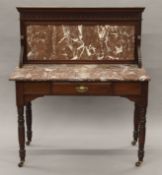 A Victorian marble-topped wash stand. 106 cm wide.