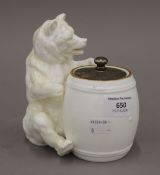 A Victorian porcelain preserve jar in the form of a bear and barrel. 16 cm high.