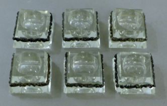 A set of six unmarked silver-mounted glass salts. Each 3.5 cm wide.