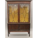 An Edwardian mahogany display cabinet.