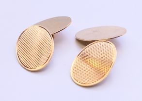 A pair of 9 ct gold cufflinks. 1.25 cm x 1.5 cm. 3.7 grammes.