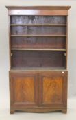 A Victorian mahogany bookcase. 103 cm wide.