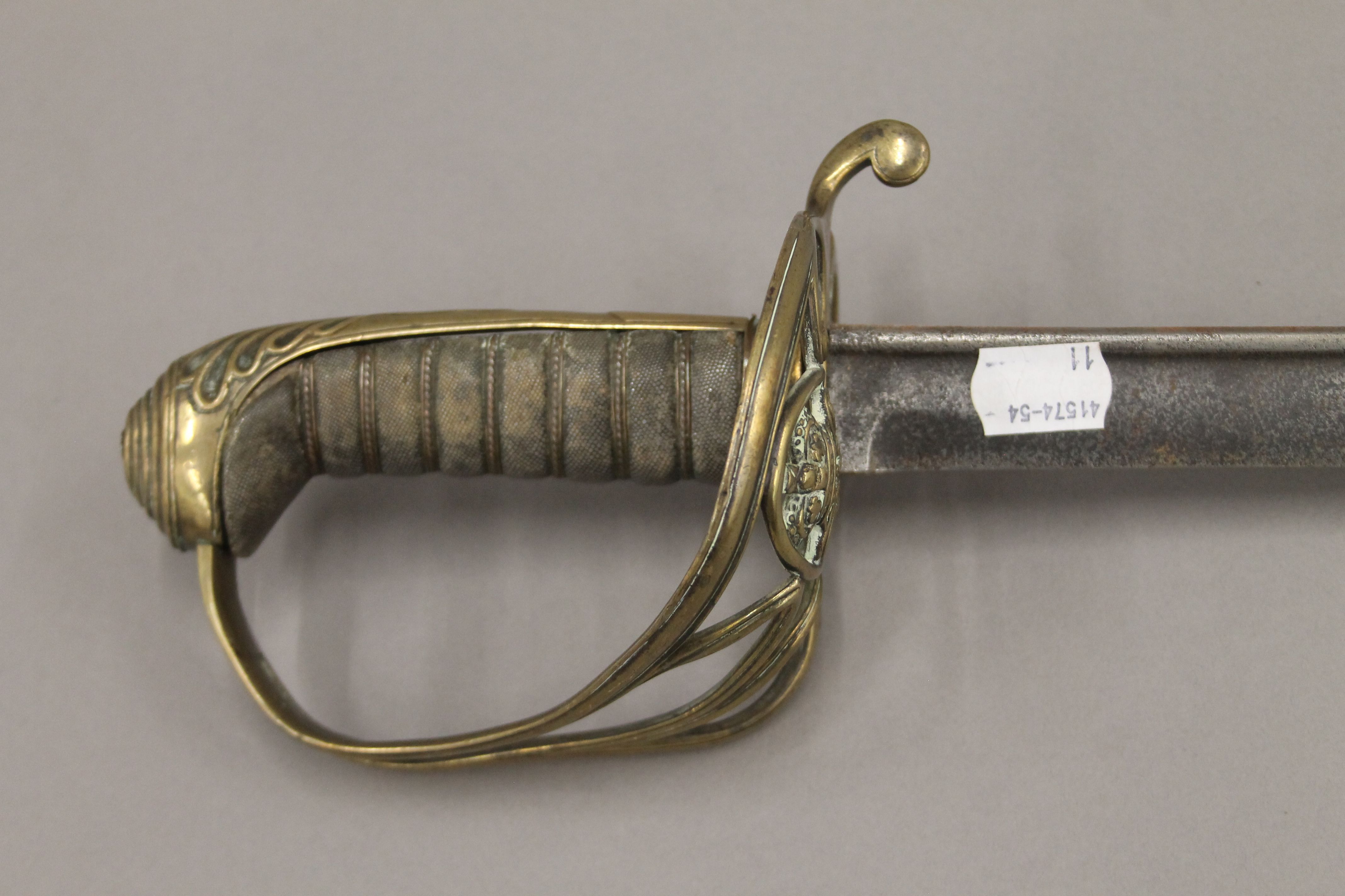 A William IV pattern 1822 infantry officer's sword in scabbard with folding guard. 98.5 cm long. - Image 4 of 4