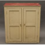 A Victorian white painted pine cupboard. 93 cm wide, 102 cm high, 46 cm deep.