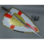 A replica sword, shield and three model knights.