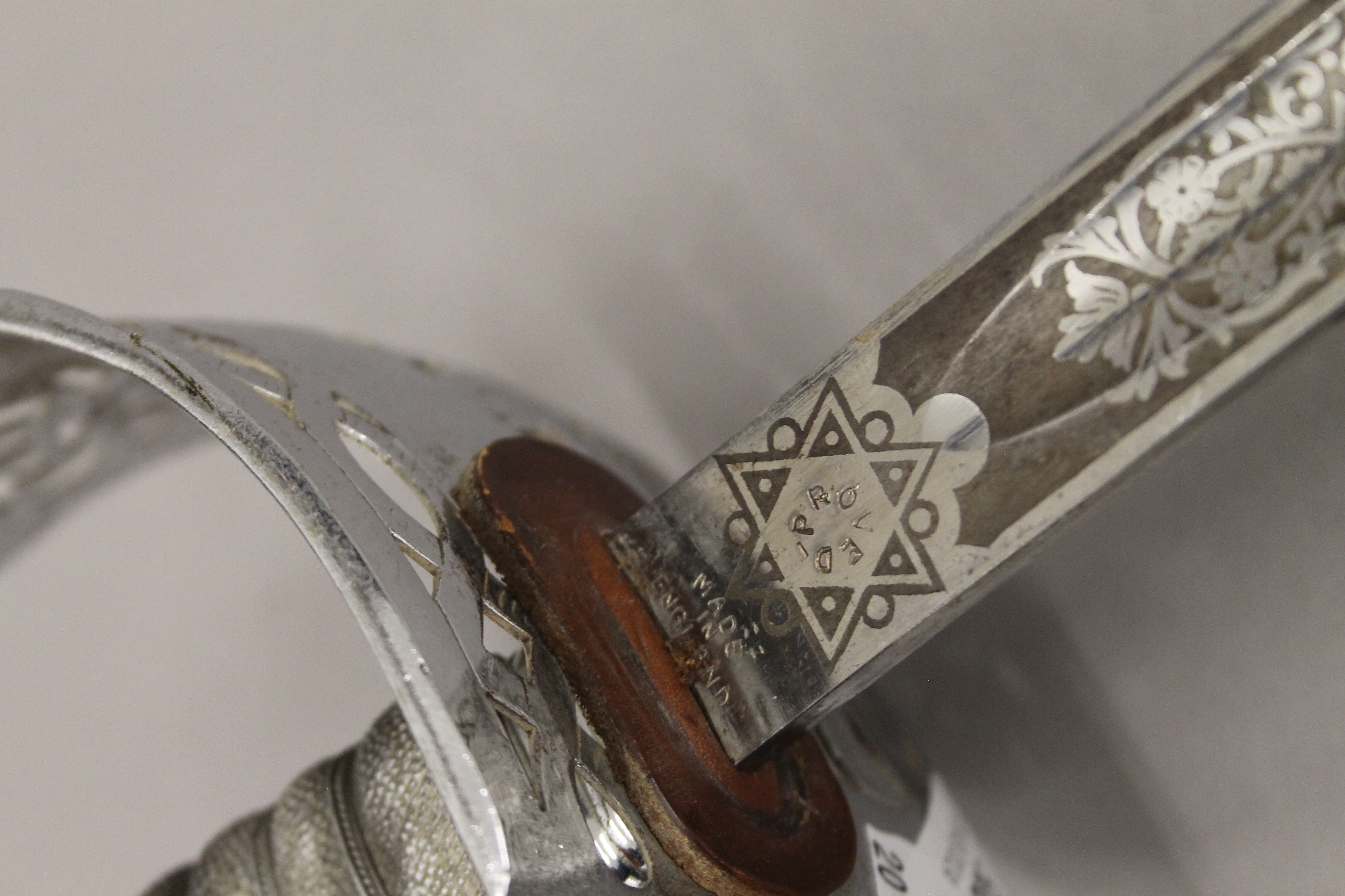 A George V service sword in leather scabbard. 102 cm long. - Image 6 of 6
