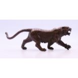 A bronze model of a tiger. 12 cm long, 5 cm high.