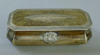 A small silver box,