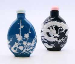 Two Chinese snuff bottles. Each approximately 5.5 cm high.