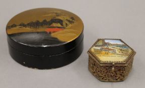A six sided box, the lid decorated with 'The Promenade Douglas' and a papier mache lacquer box.